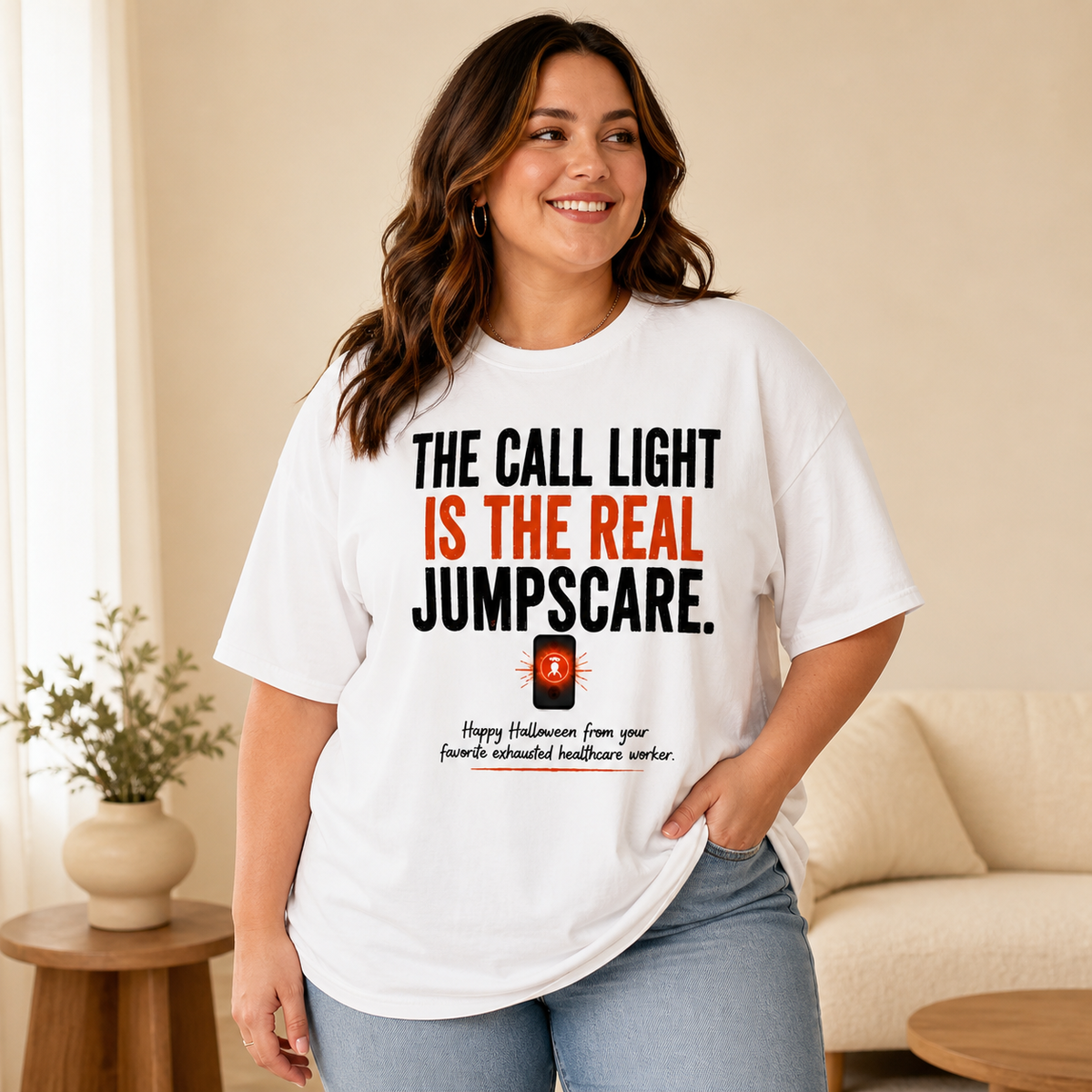 Curvy plus-size woman wearing the white Call Light Halloween Nurse oversized Comfort Colors tee