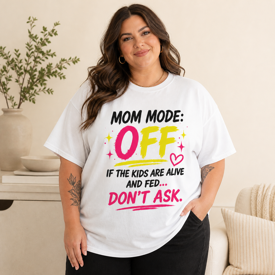 Curvy plus-size woman wearing the white Mom Mode Off oversized Comfort Colors tee