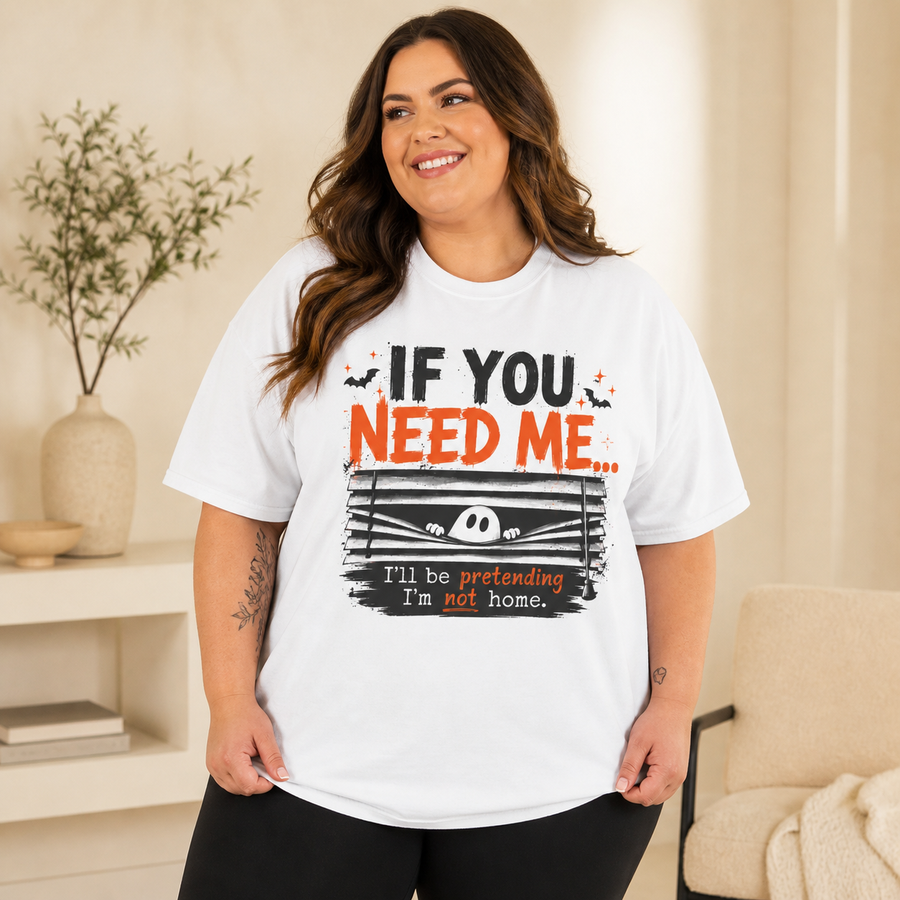 Curvy plus-size woman wearing the white Pretending I'm Not Home oversized Comfort Colors tee